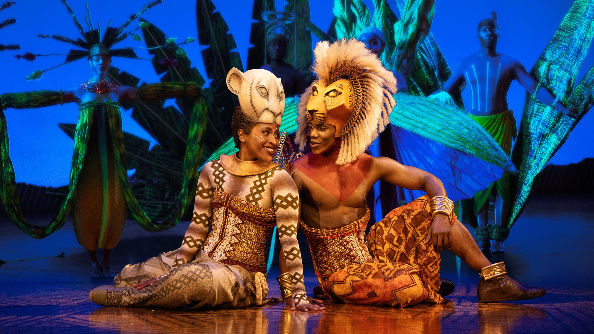 In an image from Disney Theatrical Group’s The Lion King on Broadway, Pearl Khwezi as Nala, left, and Mduduzi Madela as Simba, right, are seen on stage. 