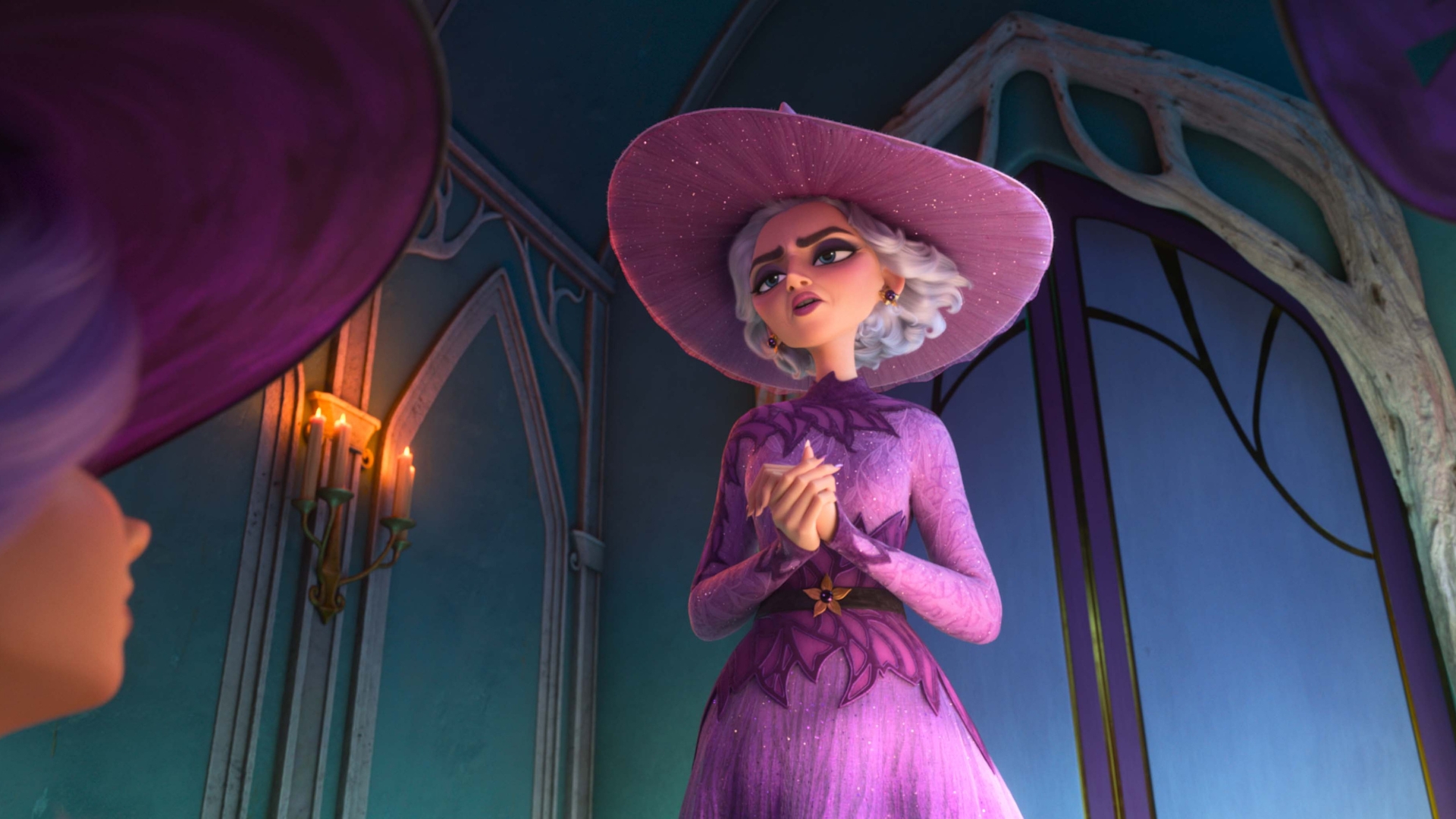 In this scene from Walt Disney Animation Studios&rsquo; Hexed, Queen Celeste, wearing a purple dress and hat with floral embroidery, clasps her hands and looks down at a witch.