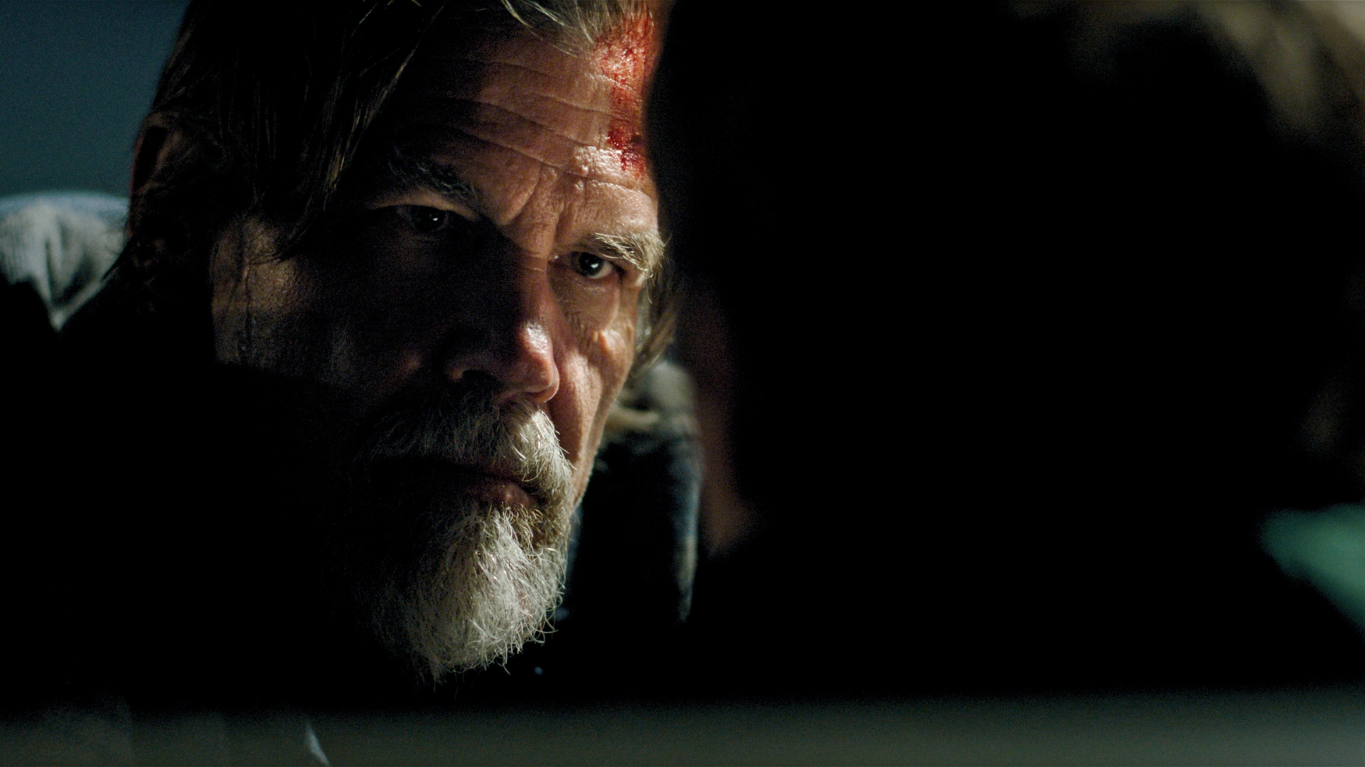 A closeup of Mitt Gardiner, played by Josh Brolin, in a scene from 20th Century Studios&rsquo; Whalefall