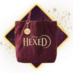Disney Hexed tote bag with a character-themed charm and the Hexed logo printed on the front.
