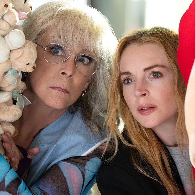 Jamie Lee Curtis and Lindsay Lohan, reprising their roles in Freaky Friday 2, peer cautiously from behind a wall of plush teddy bears.